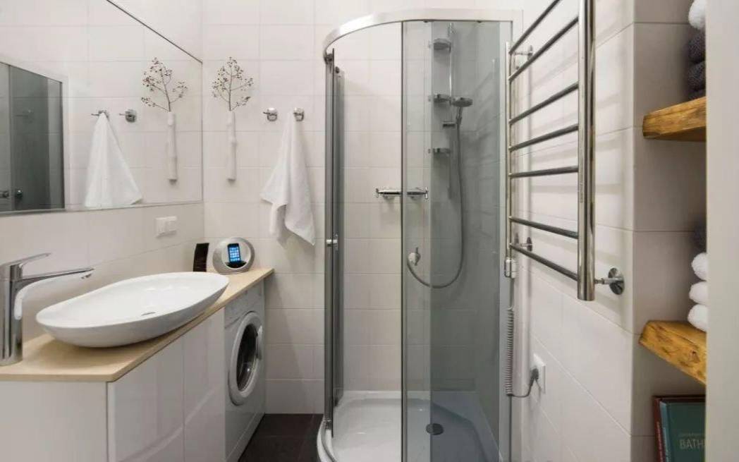 洗衣机放卫生间的坏处（洗衣机放卫生间怕水吗）