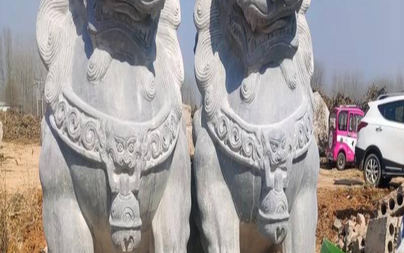 门口放石狮子的来历（为什么门口要放石狮子）